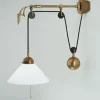 Verstellbare Wandleuchte mit Zugschalter Glas Messing