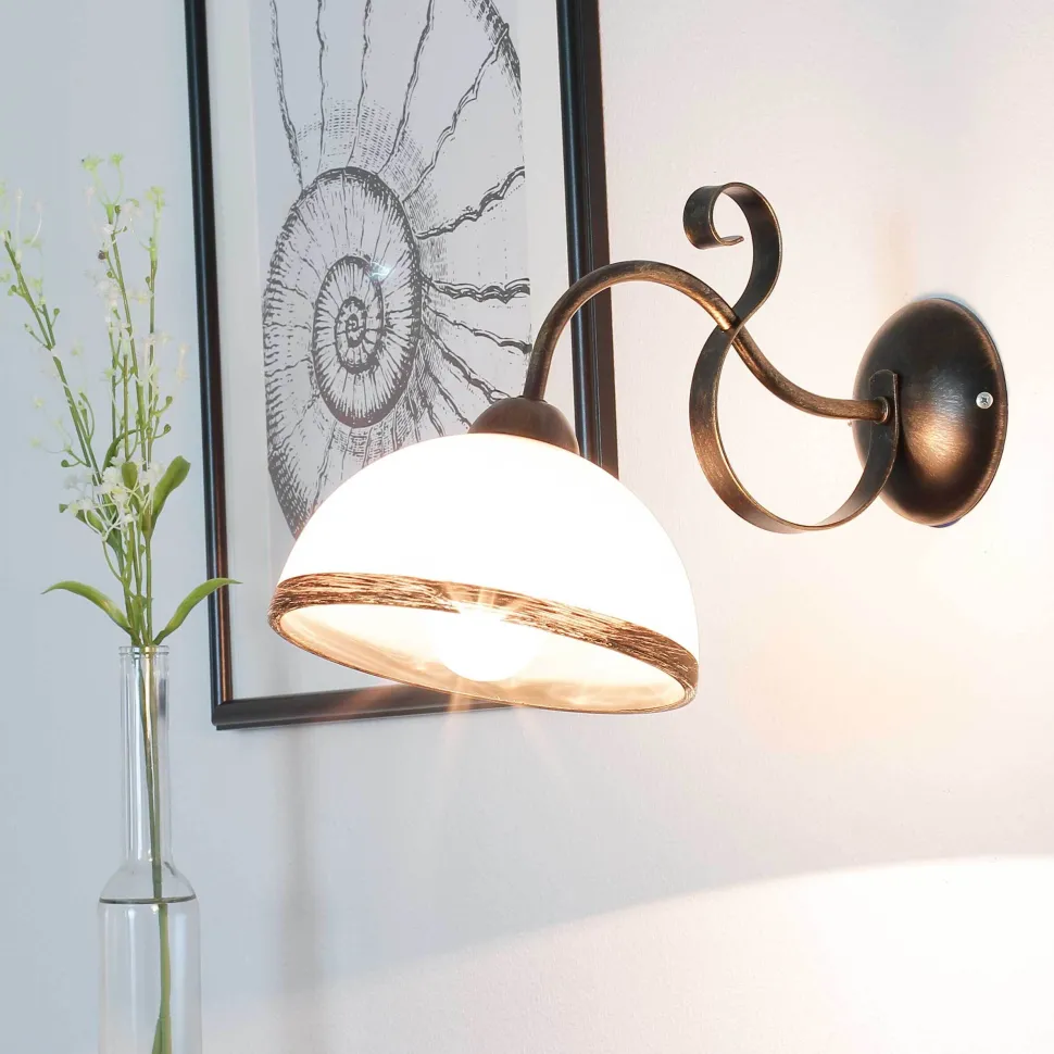 Wandleuchte ANTICA in Messing Patina