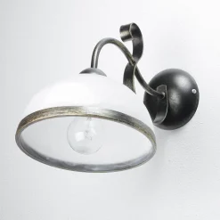 Wandleuchte ANTICA in Messing Patina